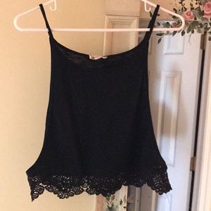 Black tank top with lace trim and cut out sides